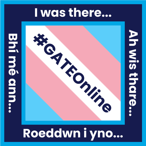 The protest badge for GATE Online. The trans flag is in the middle with #GATEOnline written on the white middle. The outside border is dark blue and has 'I was there...' 'Ah wis thare...' 'Roeddwn i yno...' and 'Bhí mé ann...' written around it.