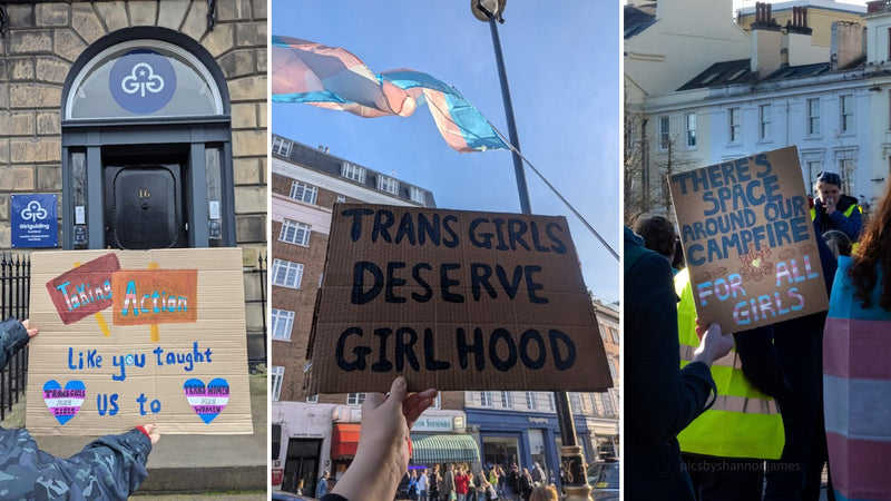 Trans flags and protest signs outside Girlguiding locations reading "taking action like you taught us to", "trans girls deserve girlhood", "there's space around our campfire for all girls"